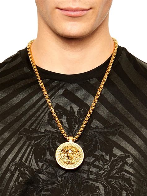 versace gold jewelry for men.